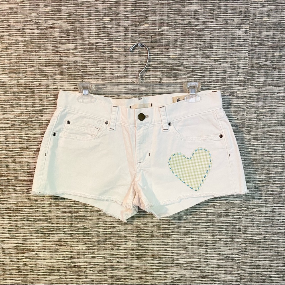 White Jean Shorts with Lime Green Hand-Sewn Heart